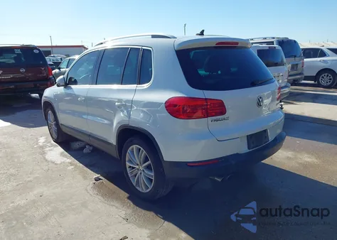 2014 Volkswagen Tiguan Sel z USA, uszkodzony, nr VIN WVGAV3AX2EW557592